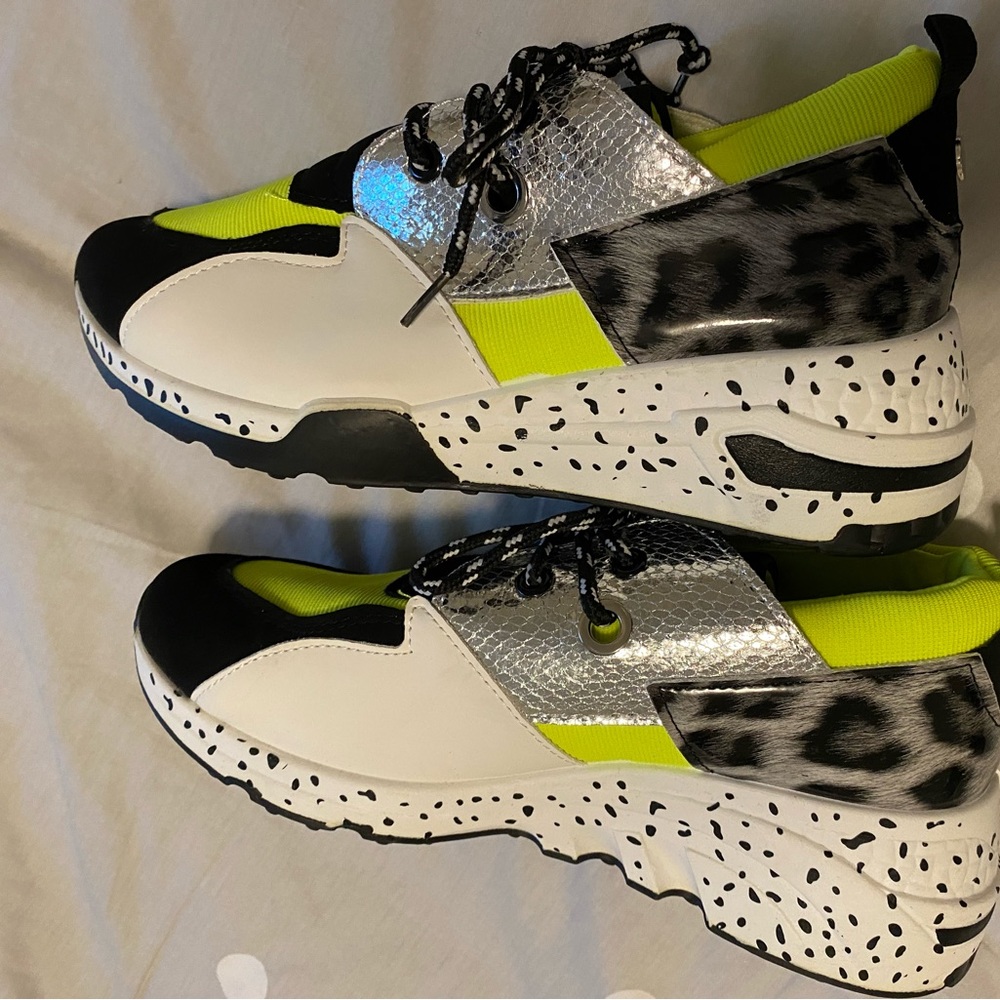 Neon and animal print trendy sneakers. Hidden wedge platform.